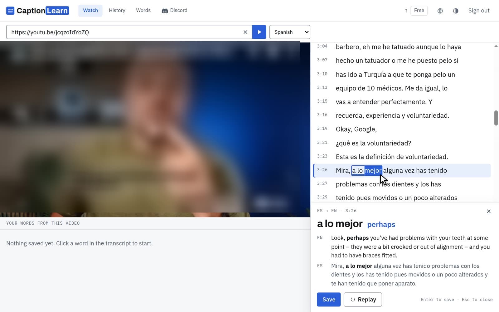 CaptionLearn on a laptop: video, transcript and the card for a lo mejor